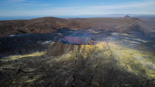 Free A Crater of a Volcano Under a Blue Sky Stock Photo
