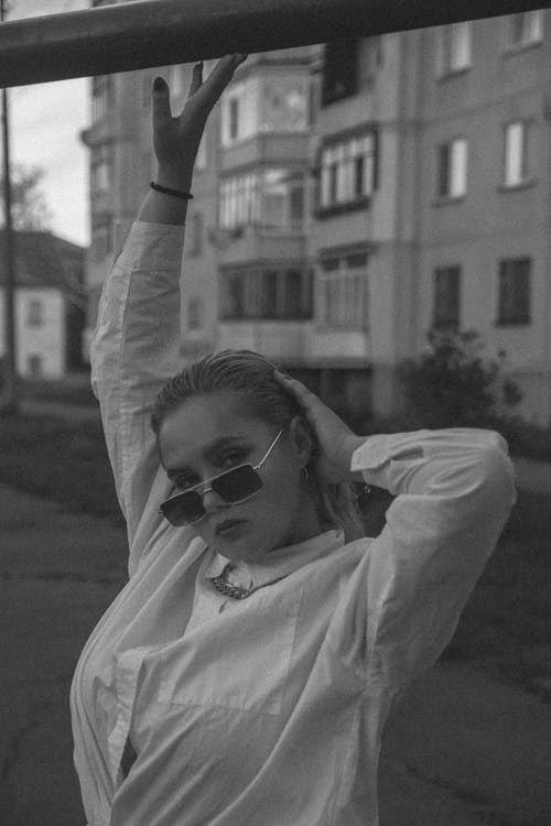 Black and White Portrait of Blond Hair Woman in White Shirt