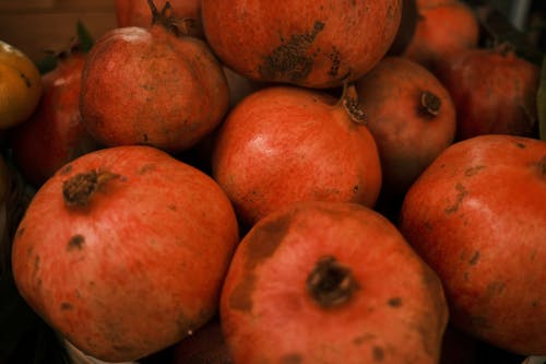 Free Pomegranates in Close Up Photography Stock Photo