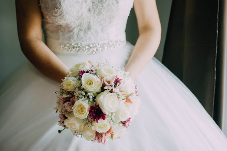 A Bride Holding Flowers 