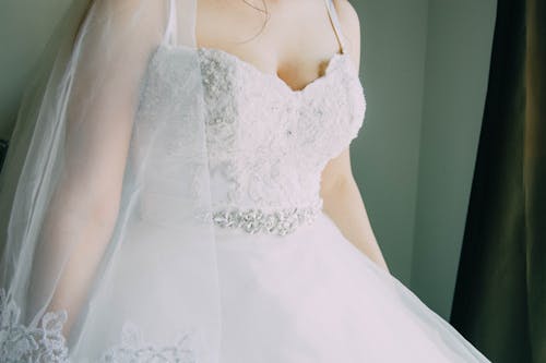 Free An Unrecognizable Woman Wearing a Wedding Dress Stock Photo