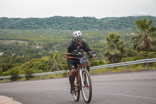 A Man Riding a Mountain Bike