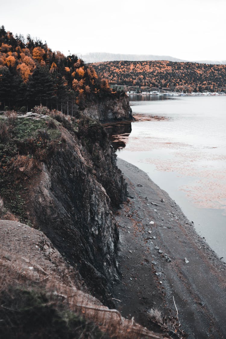 Small Beach By Cliffs On Lakeshore