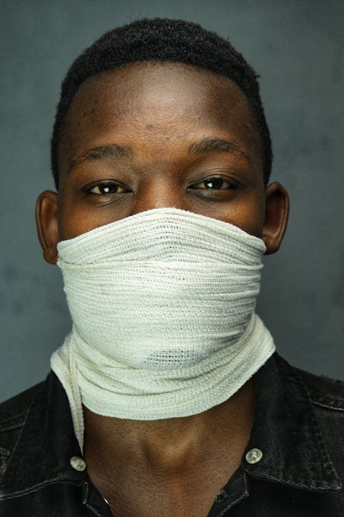 Free Bandage Wrapped on a Man's Face Stock Photo