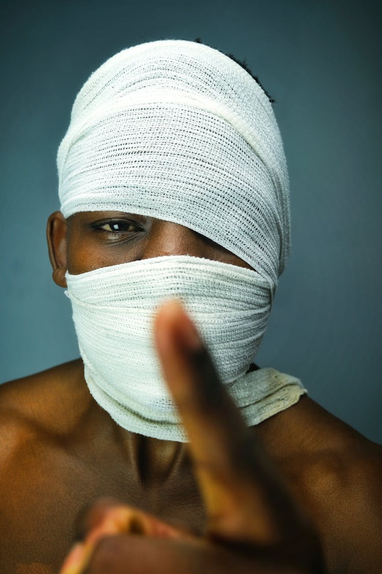 A Man's Head Wrapped With Gauze