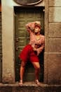 Afro-American Female Model Standing and Posing in Recess of Door