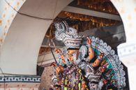 A Statue of Durga Puja with Leis