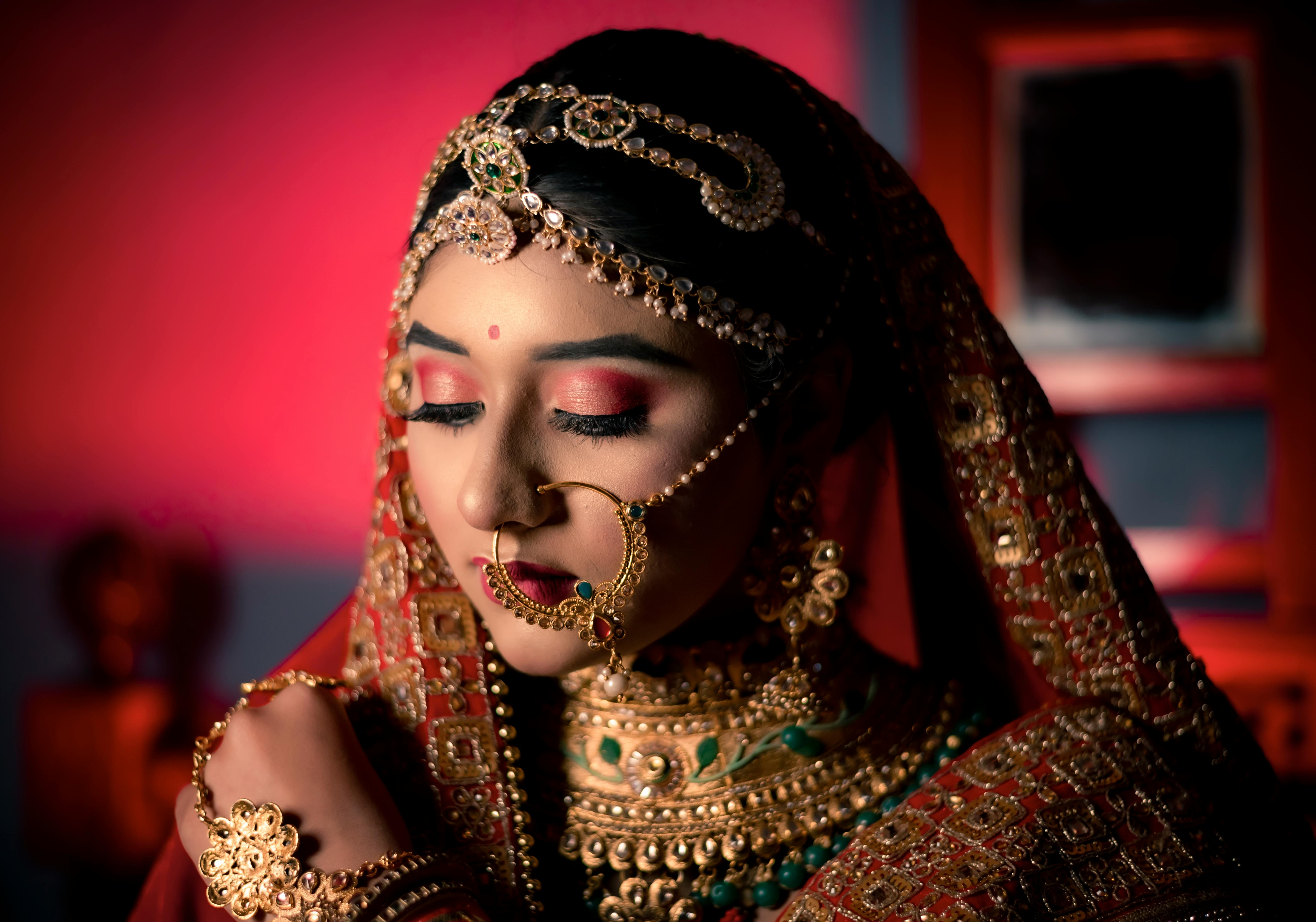 A Woman Wearing Bridal Jewelries · Free Stock Photo