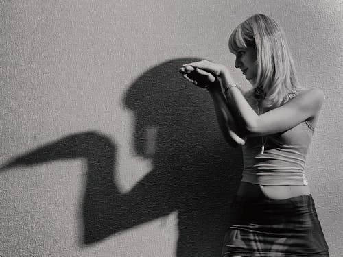 Woman Standing Near Wall