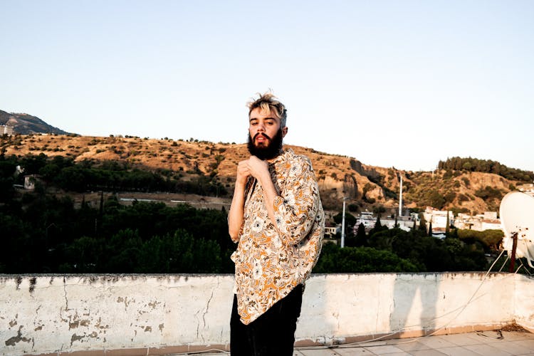 Bearded Man Wearing Floral Polo Shirt