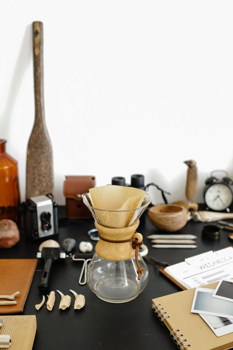 Close-Up View Of Souvenirs On Desk