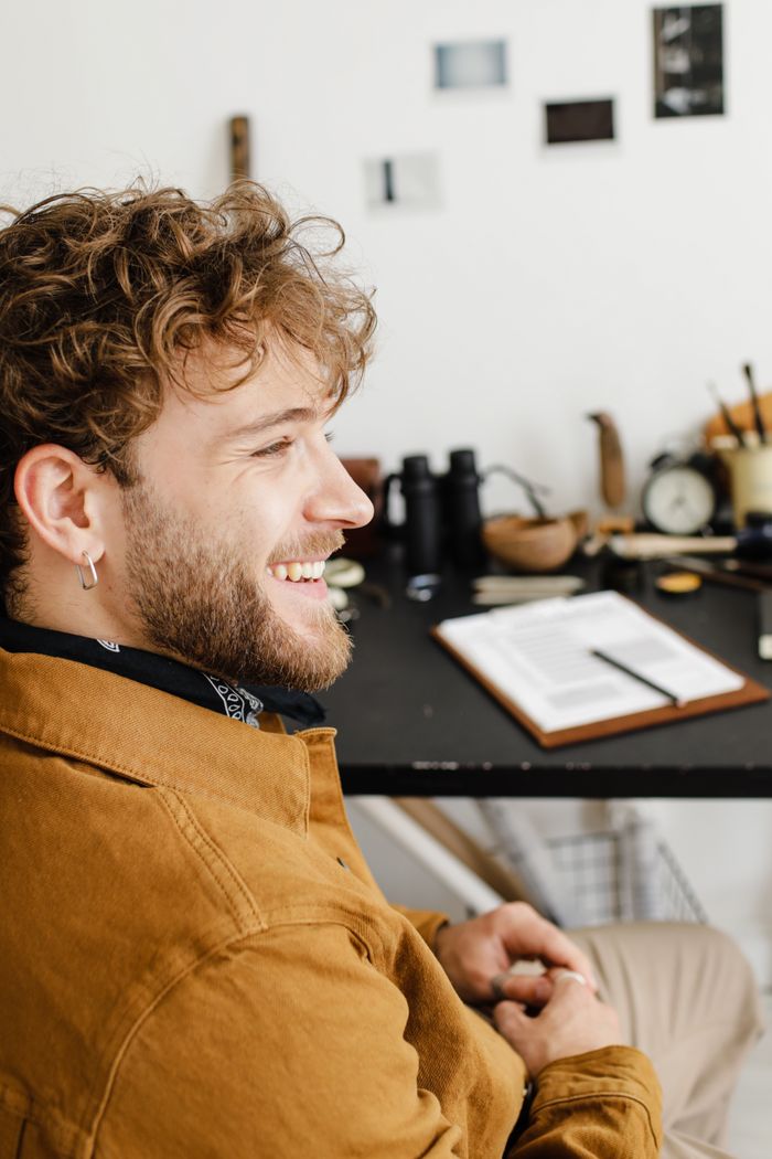 Marcus Ellery at his home studio desk — photo by Ron Lach on Pexels