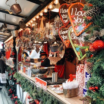 Colorful Christmas market stall with festive decorations in Nottingham, UK.