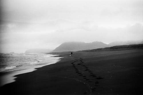 Footprints on the Beach Sand