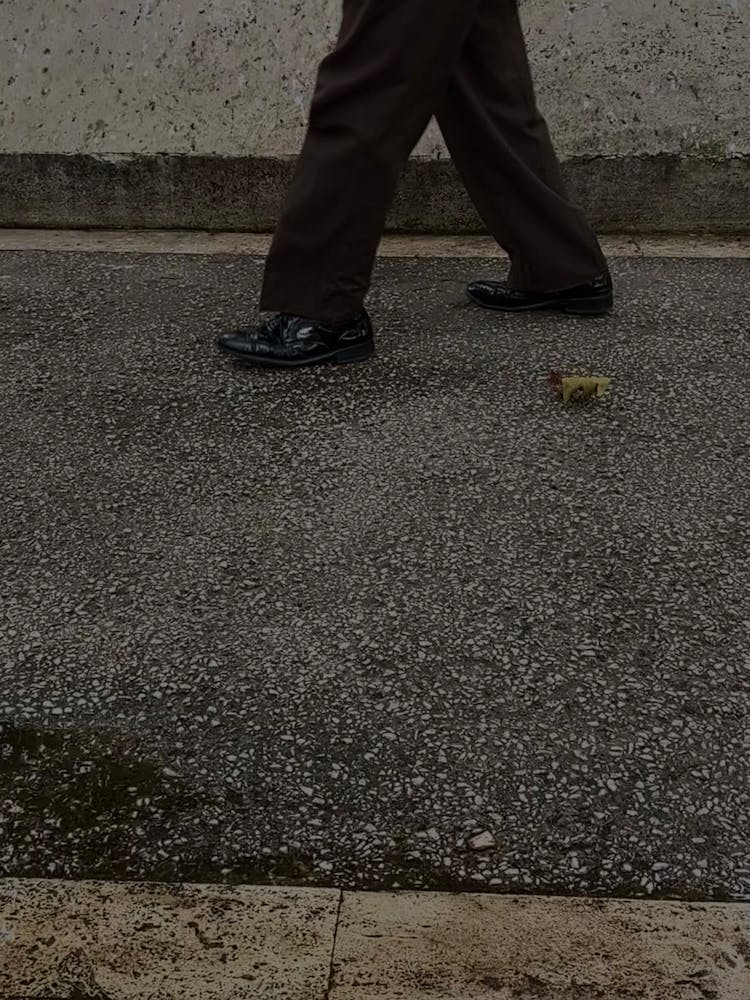 Person Walking Wearing Leather Shoes