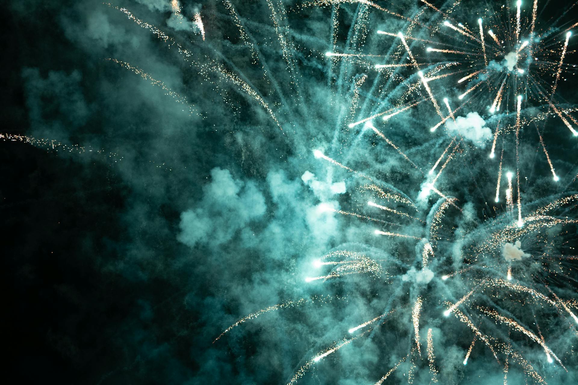 Blue Fireworks Exploding in Sky