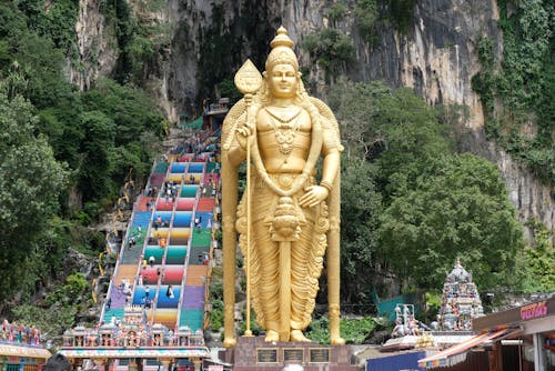 Free Golden Statue in Batu Caves Malaysia Stock Photo