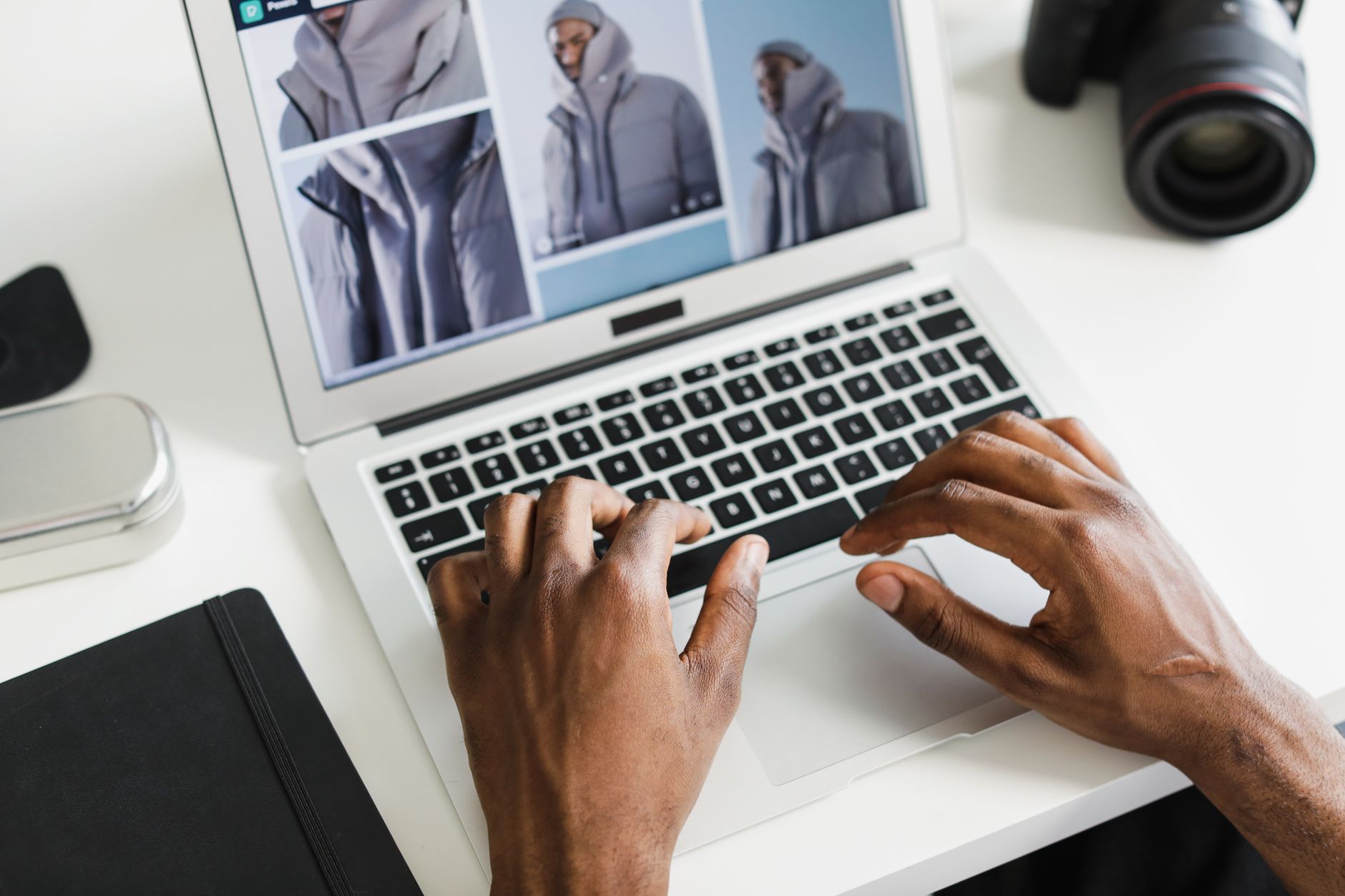 Hands typing on laptop while checking web session