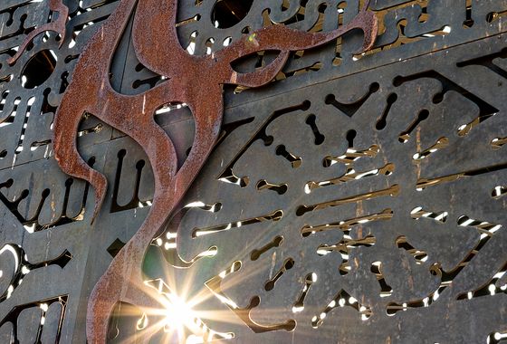 Decorative laser cut metal panel
