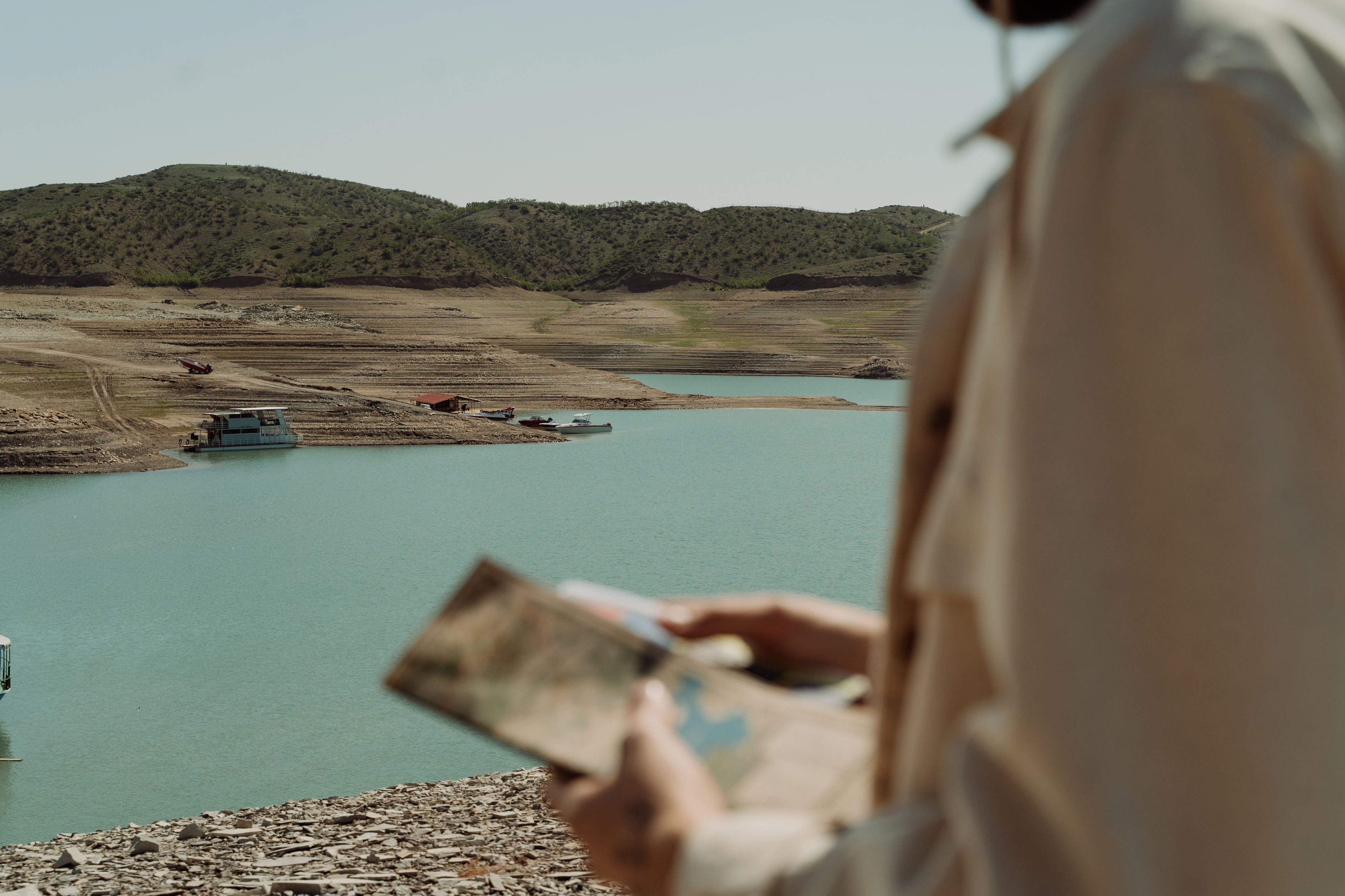Traveler consulting an offline map in the remote Siwa Oasis, Egypt