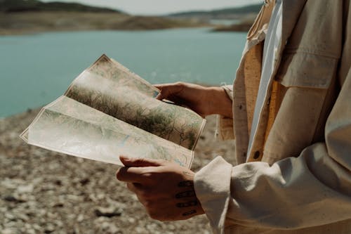 Person holding a Map 