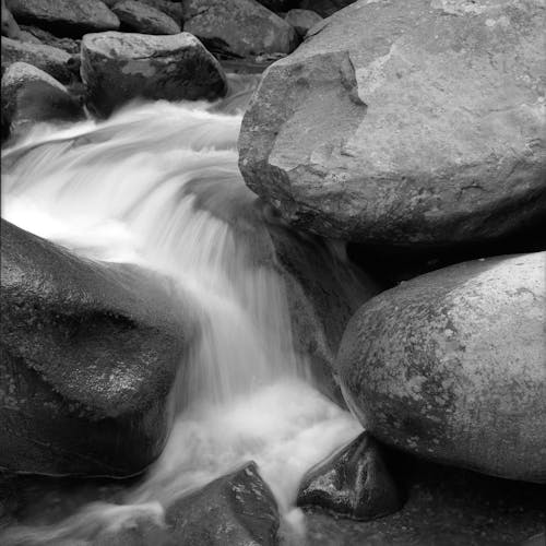 Free Water Flowing on Rocks Stock Photo