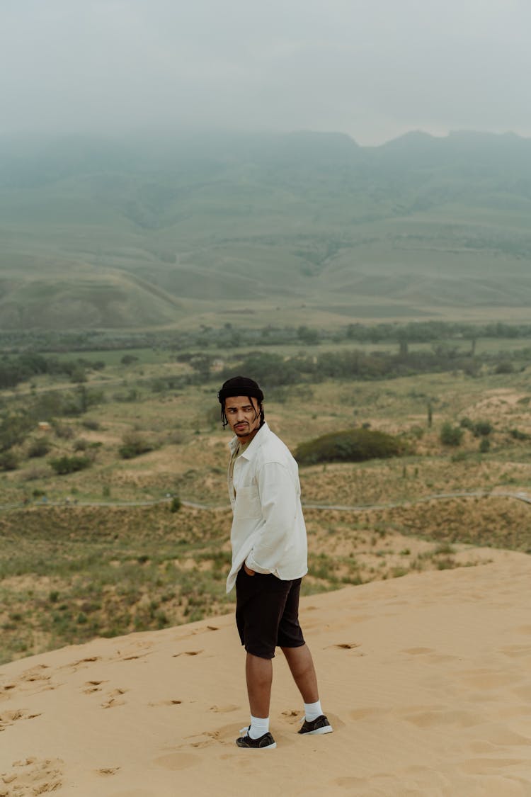 Man In Casual Wear Enjoying The Outdoors