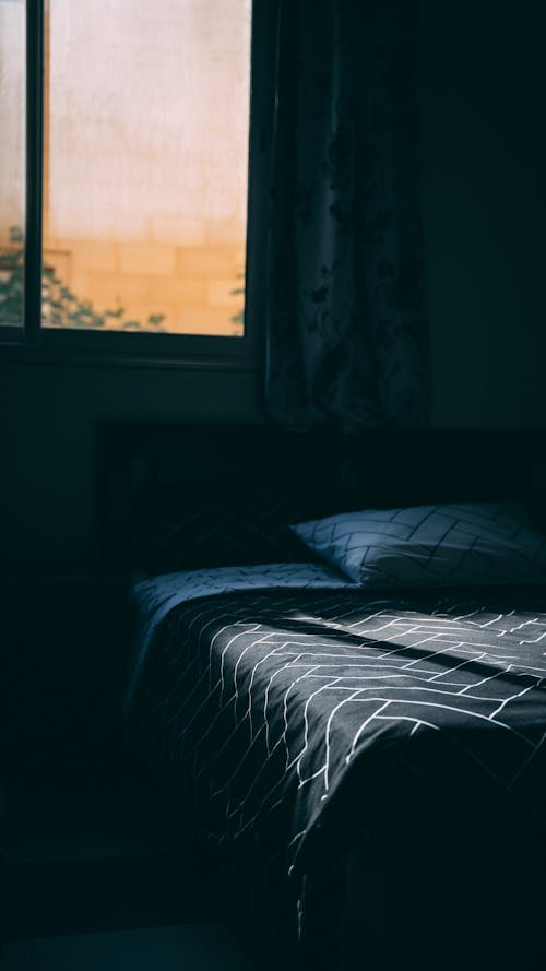 A Photo of a Dark Bedroom