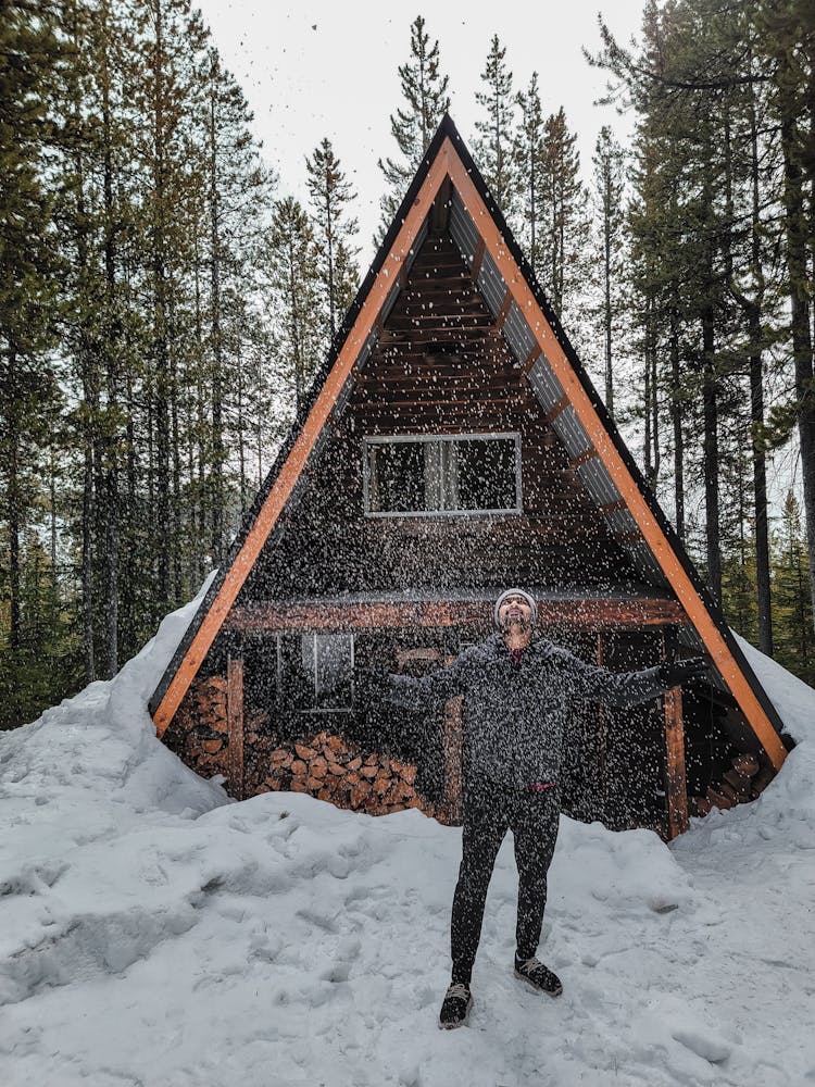 Man Looking At The Falling Snow