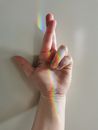 A Hand with Fingers Crossed