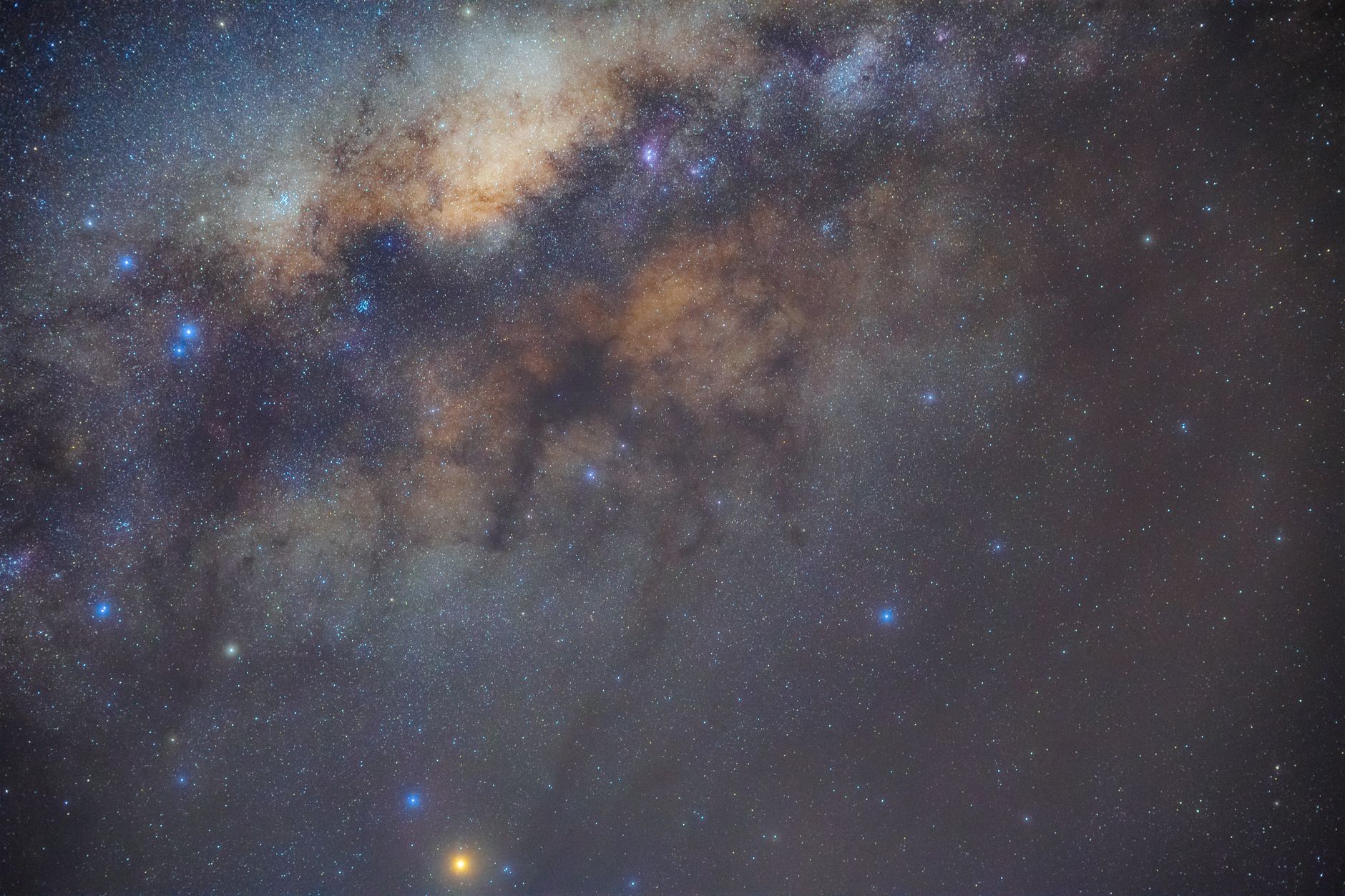 Captivating image of the Milky Way Galaxy illuminating the night sky with vibrant stars and cosmic clouds.