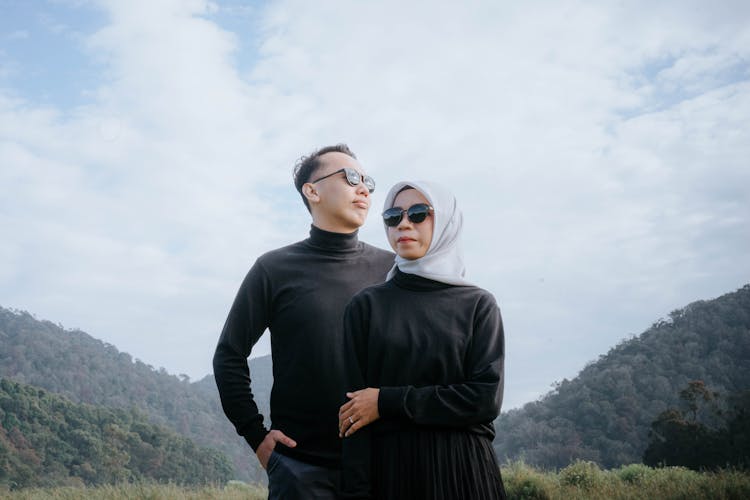 Man And Woman Wearing Black Turtleneck Long Sleeves