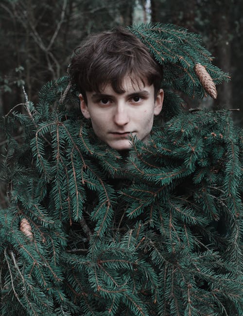 Man Wrapped with Green Pine Leaves