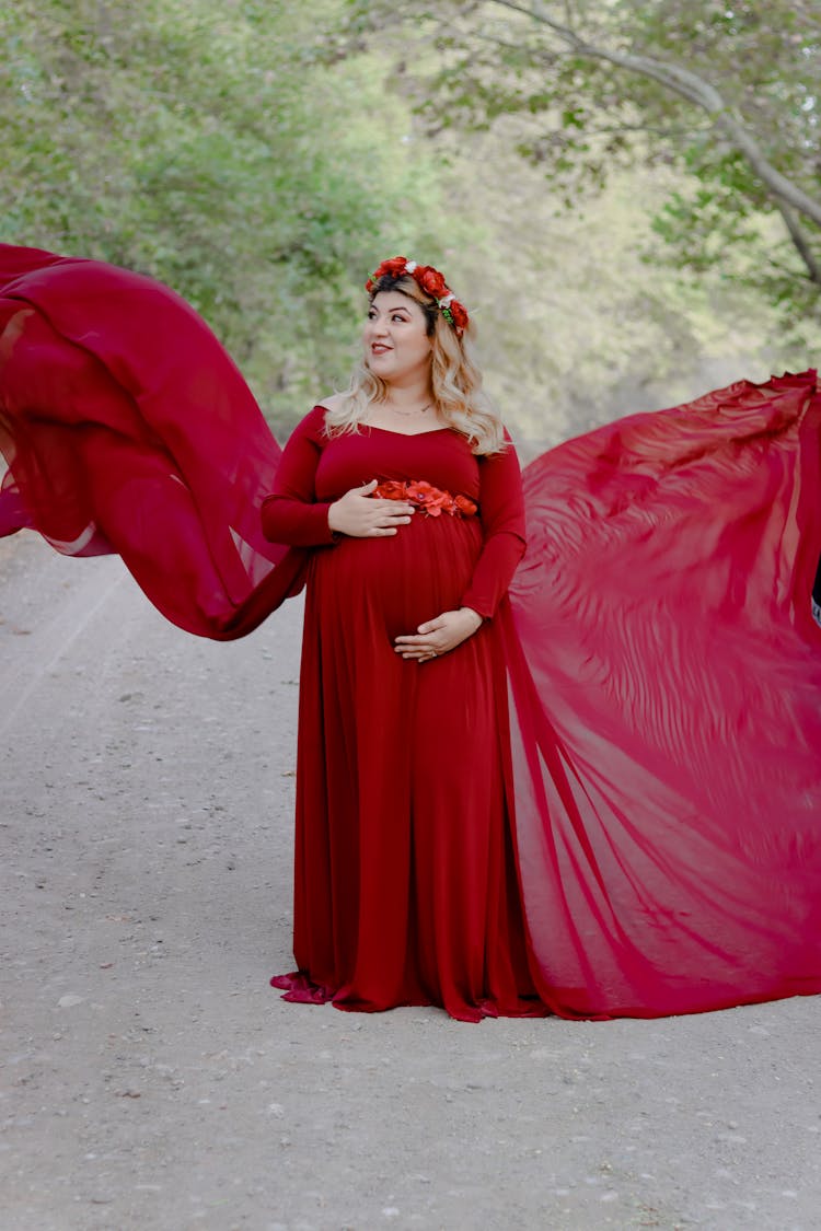 Portrait Of Plus Sized Woman In Red Dress