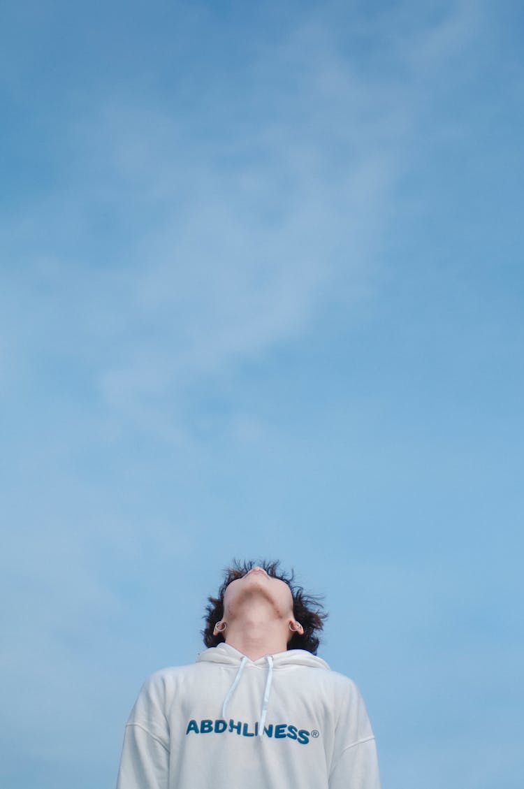 Portrait Of Man Under Blue Sky