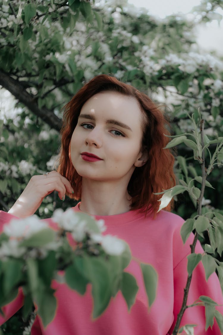 Portrait Of Woman Among Flowers