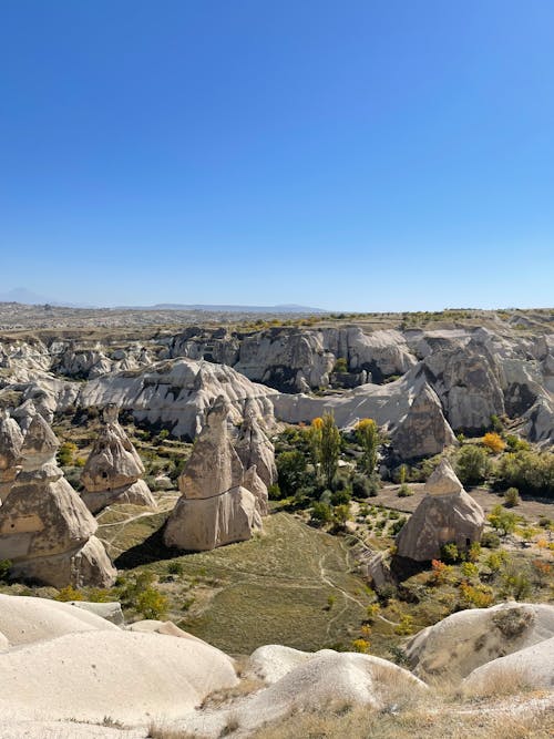 Gray Rock Formations Under Blue Sky