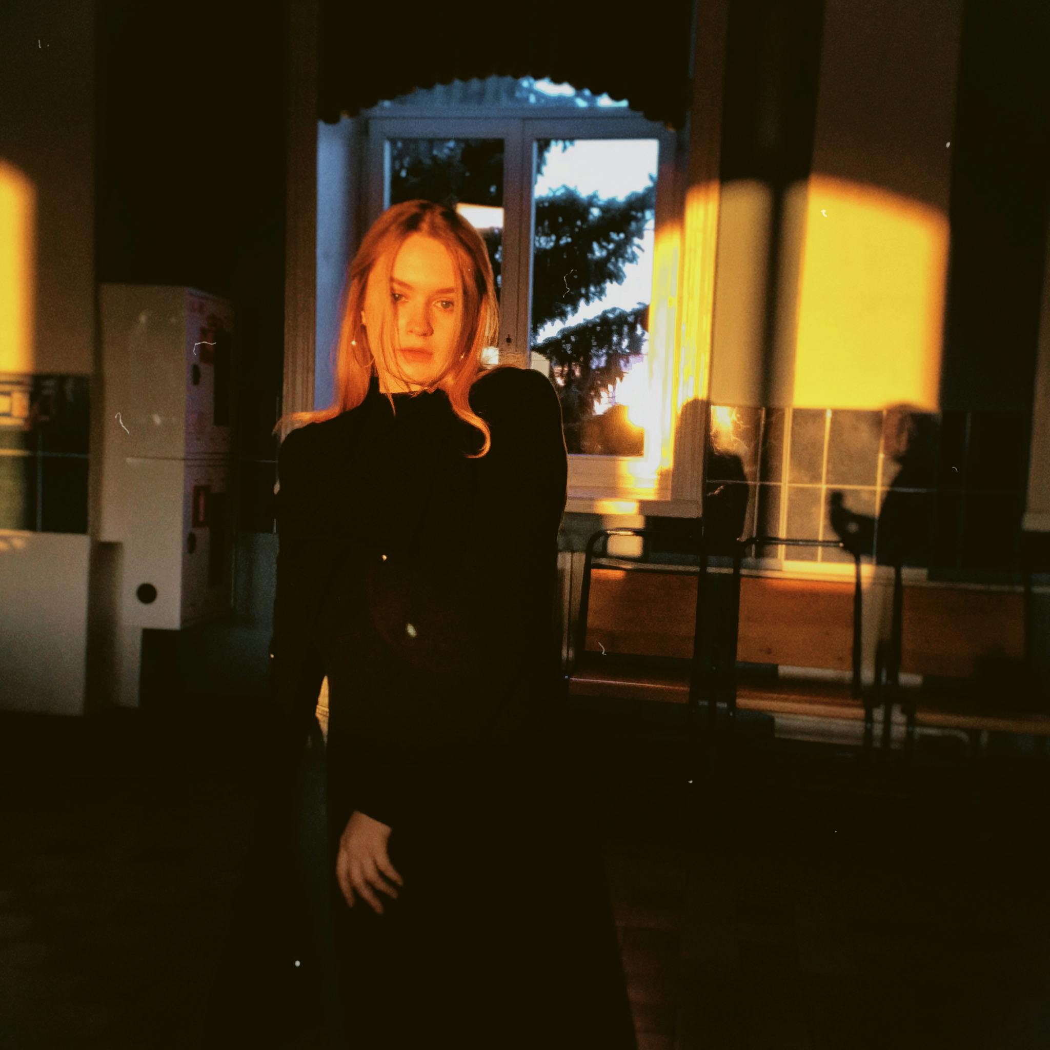 Indoor Portrait of Blond Woman