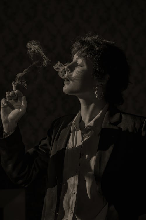 Free Black and White Photo of a Woman Smoking Cigarette Stock Photo