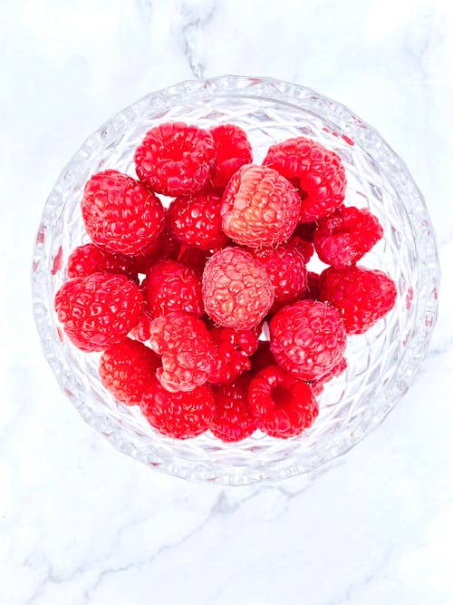 Raspberries in Glass Bowl