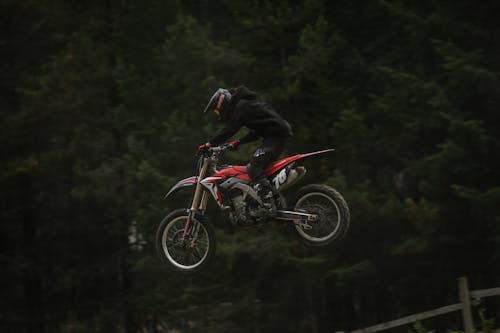 Racer Jumping a Motorcycle in the Air