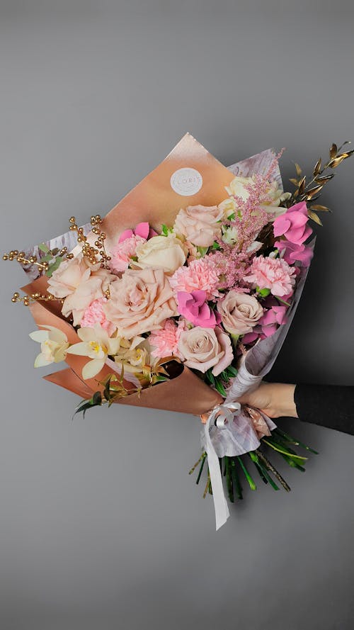 Free Person Holding Large Bouquet of Flowers Stock Photo