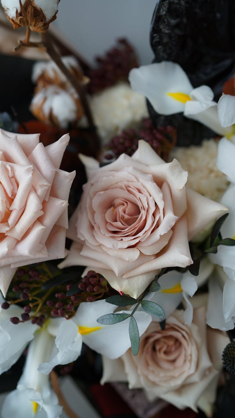 Bouquet Of Pale Pink Roses And White Irises With Floral Decorations