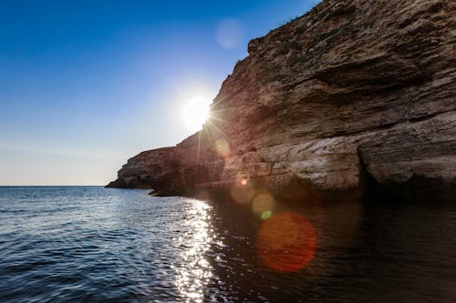 Foto d'estoc gratuïta de a l'aire lliure, aigua, capvespre