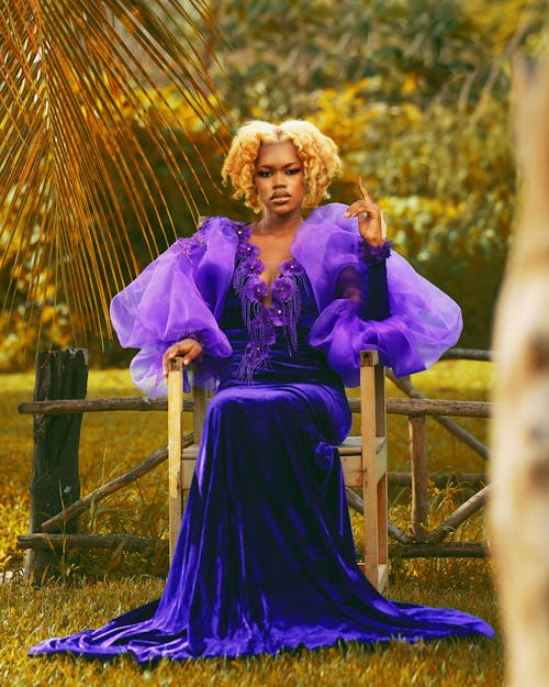 Woman in Purple Dress in Tropical Scenery