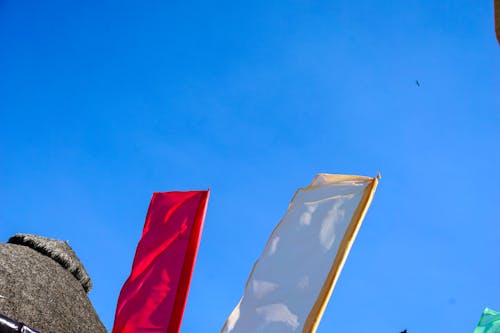 Free stock photo of blue sky, colours, flags