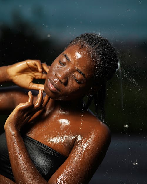 Water Falling on Woman