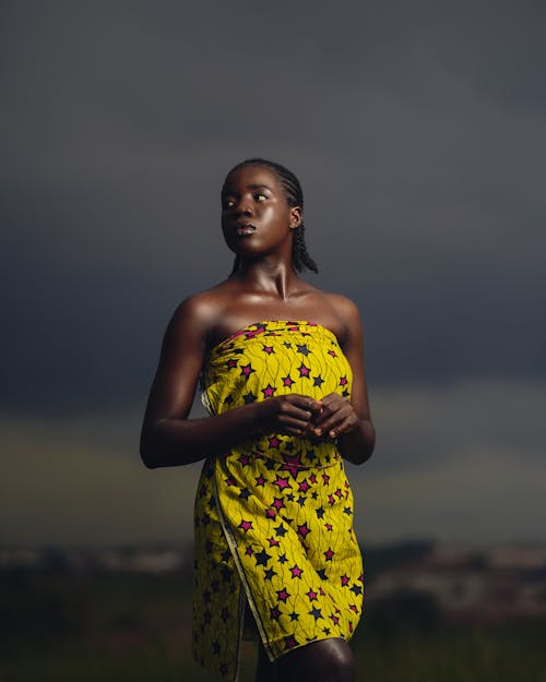 Woman in Yellow Dress Looking Away