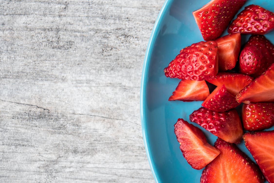 Free Bowl of Slices of Strawberries Stock Photo