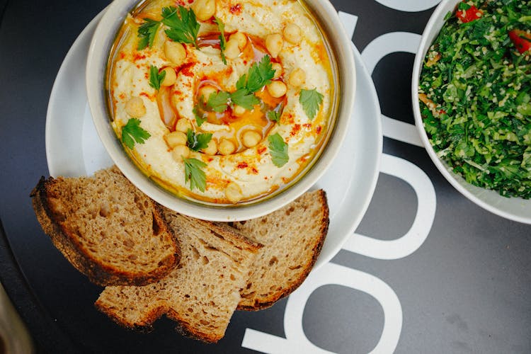 Hummus On White Ceramic Bowl